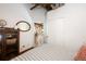 Bedroom showcasing hardwood floors and a view of other spaces, and a storage cabinet at 1143 Auraria Pkwy # 203, Denver, CO 80204