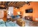 Stylish living room with a view to the bedroom, featuring hardwood floors and plenty of light at 1143 Auraria Pkwy # 203, Denver, CO 80204