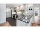 Modern kitchen with granite countertops and stainless steel appliances at 4820 Newton St, Denver, CO 80221