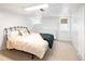 Finished basement bedroom with neutral carpet and white paneled walls at 1661 Oneida St, Denver, CO 80220
