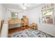 Bright, playful bedroom with unique loft bed and hardwood floors at 1661 Oneida St, Denver, CO 80220