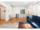 Comfortable living room with hardwood floors and stylish furnishings creating a welcoming atmosphere at 1661 Oneida St, Denver, CO 80220
