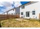 Enclosed backyard with fencing, ideal for relaxation and Gathering gatherings at 551 S Main St, Byers, CO 80103