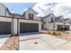 Charming two-story home with a two-car garage and well-maintained front yard at 551 S Main St, Byers, CO 80103
