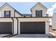 Charming two-story home with a two-car garage and well-maintained front yard at 551 S Main St, Byers, CO 80103