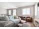 Comfortable living room featuring modern furniture and natural light at 551 S Main St, Byers, CO 80103