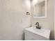 Updated bathroom with white vanity and black fixtures at 8160 S Fillmore Cir, Centennial, CO 80122