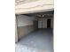 A spacious garage with a neutral gray epoxy floor ready for your vehicles and storage at 8160 S Fillmore Cir, Centennial, CO 80122