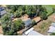 Quaint single-story home with a large fenced-in yard and mature trees, surrounded by a mix of grassy and dry areas at 1115 W Quincy Ave, Englewood, CO 80110