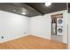 Basement rec room with washer and dryer hookups at 1115 W Quincy Ave, Englewood, CO 80110