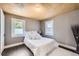Cozy bedroom with modern decor, hardwood floors and plenty of light at 1115 W Quincy Ave, Englewood, CO 80110