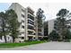 Apartment building featuring well-maintained landscaping and architecture at 13902 E Marina Dr # 303, Aurora, CO 80014