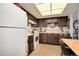 Well-appointed kitchen with modern appliances and ample counter space at 13902 E Marina Dr # 303, Aurora, CO 80014