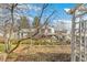 Backyard and partial exterior view of home with a garden, pergola, and plenty of space at 7681 S Jellison St, Littleton, CO 80127