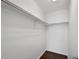 A walk-in closet with white walls and a chrome clothing rack at 20888 E 51St Pl, Denver, CO 80249
