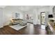 Cozy living room featuring stylish decor, a comfortable sofa, and bright natural light at 20888 E 51St Pl, Denver, CO 80249