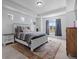 Serene bedroom with a large window, recessed lighting, and a spacious layout at 16218 E 111Th Pl, Commerce City, CO 80022