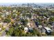 Aerial view of a neighborhood with city views and mature trees in a desirable location at 2034 Newton St, Denver, CO 80211