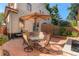 Cozy backyard patio with an outdoor table and seating, ideal for gatherings and relaxing at 2034 Newton St, Denver, CO 80211