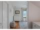 A Bedroom featuring a changing table and a patterned rug under a window at 2034 Newton St, Denver, CO 80211
