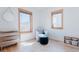 Bright Bedroom room with light-colored walls and natural wood trim at 2034 Newton St, Denver, CO 80211