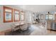 Spacious open floorplan with dining area, wood floors and lots of natural light at 2034 Newton St, Denver, CO 80211