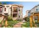 Beautiful front exterior with stone accents, a charming yard, and a private walkway at 2034 Newton St, Denver, CO 80211