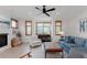 Inviting living room with large windows, modern decor, and stylish furnishings at 2034 Newton St, Denver, CO 80211