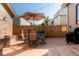 Outdoor patio with ample seating, grill, and string lights perfect for entertaining and summer nights at 2034 Newton St, Denver, CO 80211