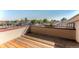 Rooftop deck with an iron railing and surrounding views at 2034 Newton St, Denver, CO 80211