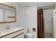 Bathroom featuring vanity sink and shower stall at 15099 E Wagontrail Pl, Aurora, CO 80015