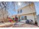 Back of home with deck and yard at 15099 E Wagontrail Pl, Aurora, CO 80015