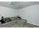 Living area featuring a comfortable sectional sofa, perfect for relaxation at 15099 E Wagontrail Pl, Aurora, CO 80015