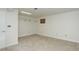 Finished basement area with new carpeting, closet area, and neutral colored walls at 15099 E Wagontrail Pl, Aurora, CO 80015