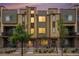 Charming townhomes featuring stone accents, modern siding, and professional landscaping at 11132 Via Lata Dr, Broomfield, CO 80020