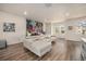Spacious living room features wood floors, contemporary decor, and abundant natural light at 11132 Via Lata Dr, Broomfield, CO 80020