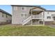 Large backyard featuring grass, gravel area, and a wooden fence for privacy at 1420 E Witherspoon Dr, Elizabeth, CO 80107