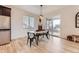 Dining area with a modern table set and sliding door access to an outdoor deck at 1420 E Witherspoon Dr, Elizabeth, CO 80107