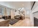 Cozy living room with stylish decor and staircase access to upper levels at 1420 E Witherspoon Dr, Elizabeth, CO 80107