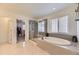 Luxurious main bathroom with a soaking tub and a walk-in glass shower at 1420 E Witherspoon Dr, Elizabeth, CO 80107