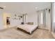 Airy main bedroom with a plush carpet and a platform bed at 1420 E Witherspoon Dr, Elizabeth, CO 80107
