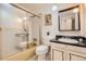 Clean bathroom with a shower/tub combo, and updated vanity at 13627 W Alaska Dr, Lakewood, CO 80228