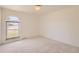 Well-lit bedroom with ample natural light and neutral carpeting at 13627 W Alaska Dr, Lakewood, CO 80228