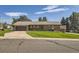 Ranch style home with a nicely landscaped yard at 13627 W Alaska Dr, Lakewood, CO 80228