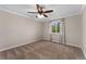 A bedroom featuring carpet flooring, a ceiling fan and a window providing natural light at 11532 Newland St, Westminster, CO 80020