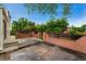 View of a concrete patio featuring a brick perimeter wall providing a private outdoor space at 11532 Newland St, Westminster, CO 80020