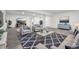 Spacious basement with multiple seating areas and stylish decor at 1180 Antelope W Dr, Bennett, CO 80102