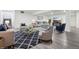 Spacious finished basement with comfortable seating areas at 1180 Antelope W Dr, Bennett, CO 80102