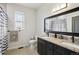 Granite countertop bathroom with double vanity at 1180 Antelope W Dr, Bennett, CO 80102