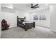 A well-lit bedroom featuring a comfortable bed and a window for natural light at 1180 Antelope W Dr, Bennett, CO 80102